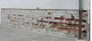 Dampness in a moistured wall / masonry work / brick work filled up with salt